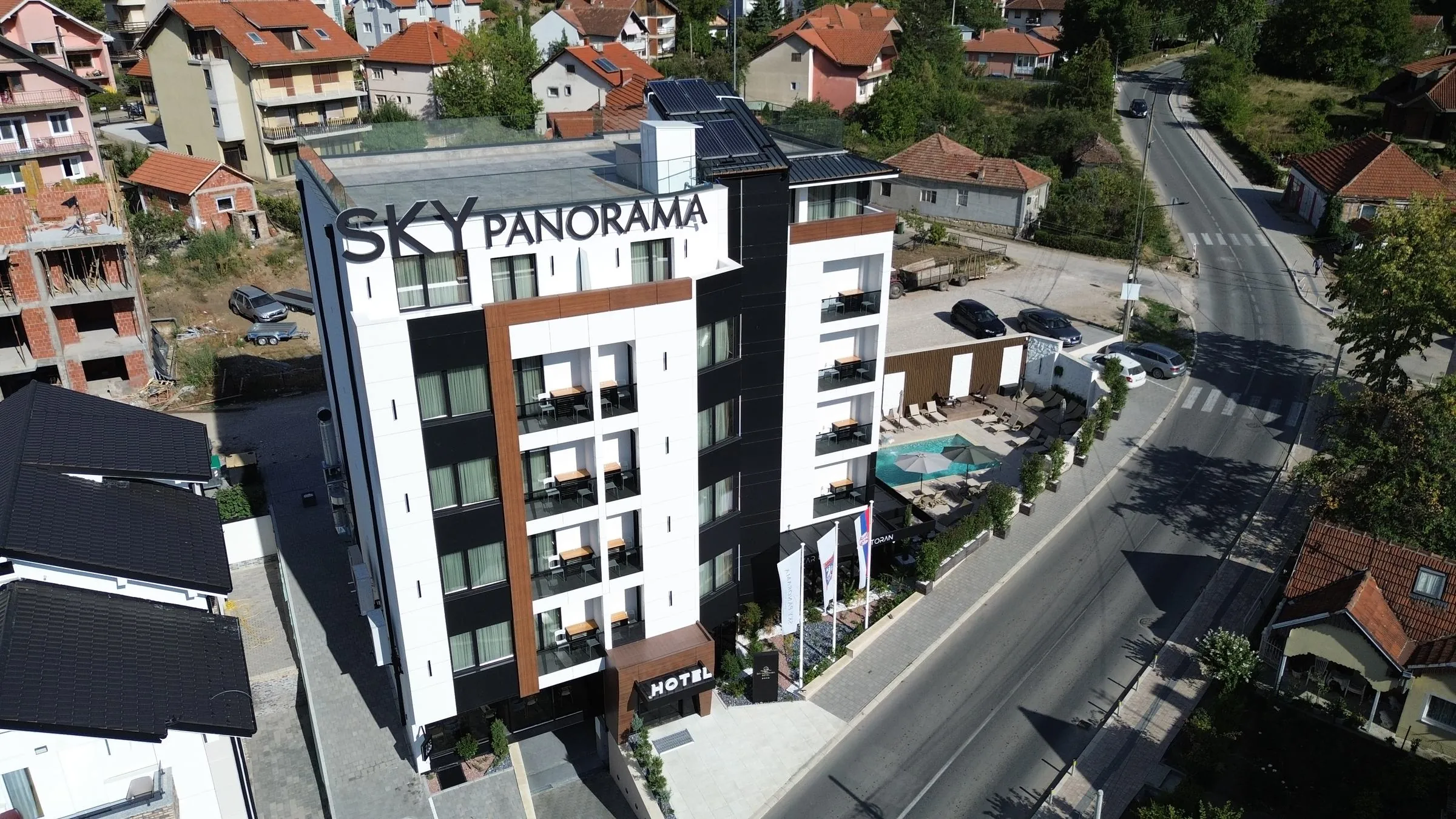 Hotel Sky Panorama from the air, with the street in front