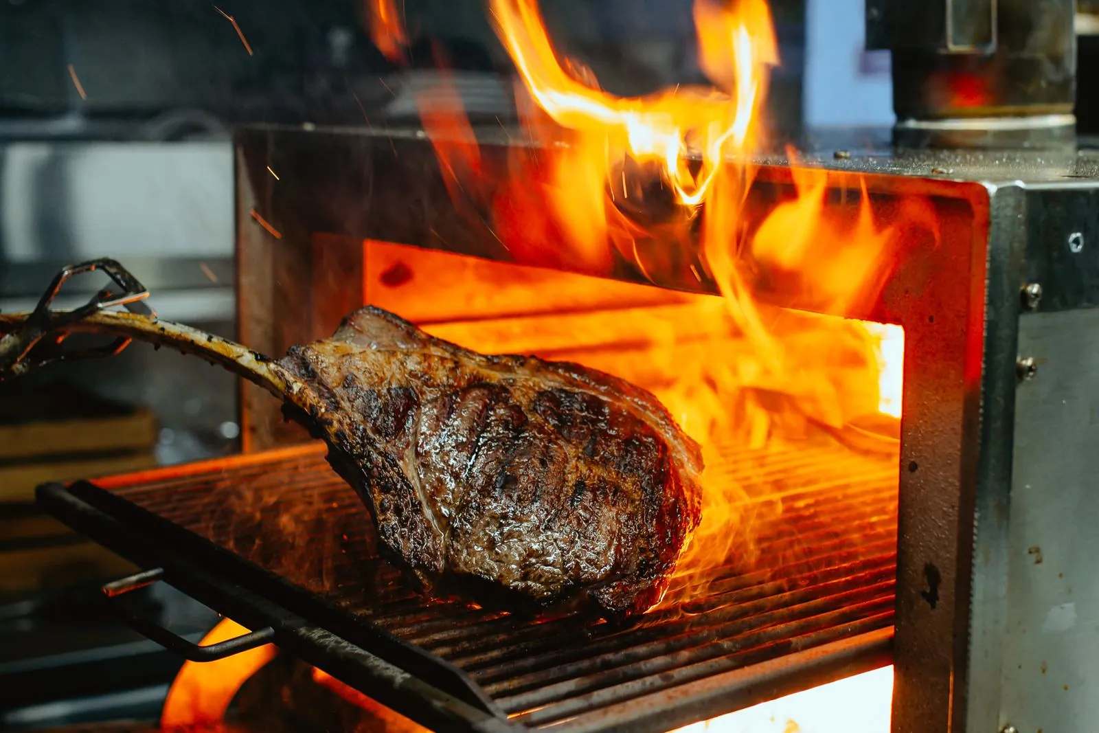 Tomahawk steak in the Josper oven, over a charcoal flame